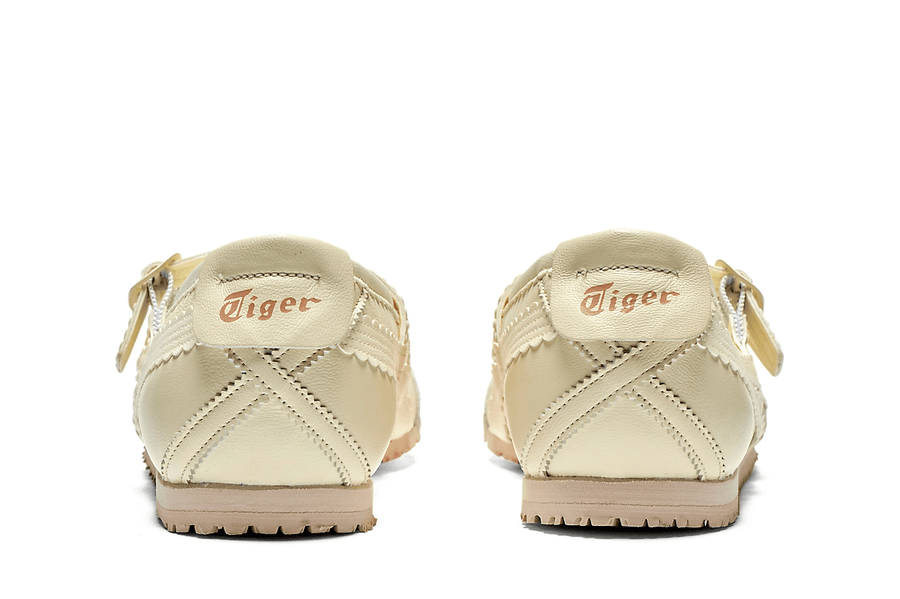 Vista em detalhe do Onitsuka Tiger Onitsuka Tiger Mexico 66 TGRS Ivory/Cream mostrando textura do material e acabamento