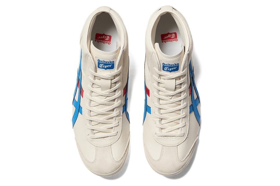 Vista do solado do Onitsuka Tiger Onitsuka Tiger Mexico Mid Runner Cream/Directoire Blue mostrando padrão de tração e tecnologia de amortecimento