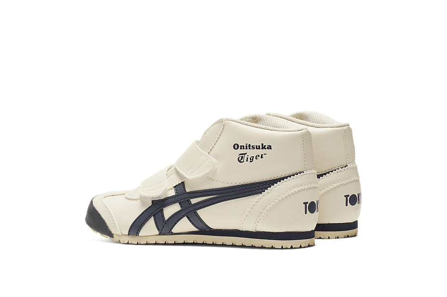 Vista do solado do Onitsuka Tiger Onitsuka Tiger Mexico Mid Runner Kids Birch/India INK mostrando padrão de tração e tecnologia de amortecimento