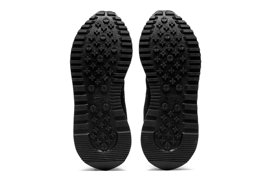 Vista em detalhe do Onitsuka Tiger Onitsuka Tiger Moage Black/Graphite Grey mostrando textura do material e acabamento