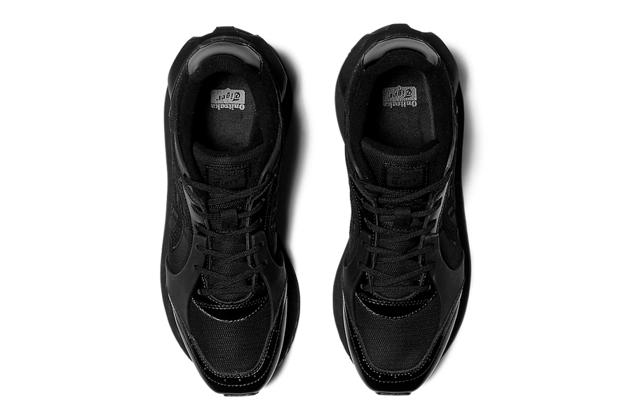 Vista do solado do Onitsuka Tiger Onitsuka Tiger Moage Black/Graphite Grey mostrando padrão de tração e tecnologia de amortecimento