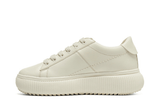 Vista lateral do Onitsuka Tiger Onitsuka Tiger Otiger Court Cream mostrando design do cabedal e logo da marca