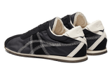 Vista traseira do Onitsuka Tiger Onitsuka Tiger Tiger Corsair A55 Black Cream mostrando calcanheira e detalhes do solado