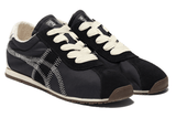 Vista superior do Onitsuka Tiger Onitsuka Tiger Tiger Corsair A55 Black Cream mostrando abertura, lingueta e cadarços
