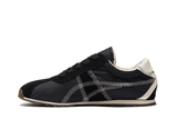 Vista lateral do Onitsuka Tiger Onitsuka Tiger Tiger Corsair A55 Black Cream mostrando design do cabedal e logo da marca