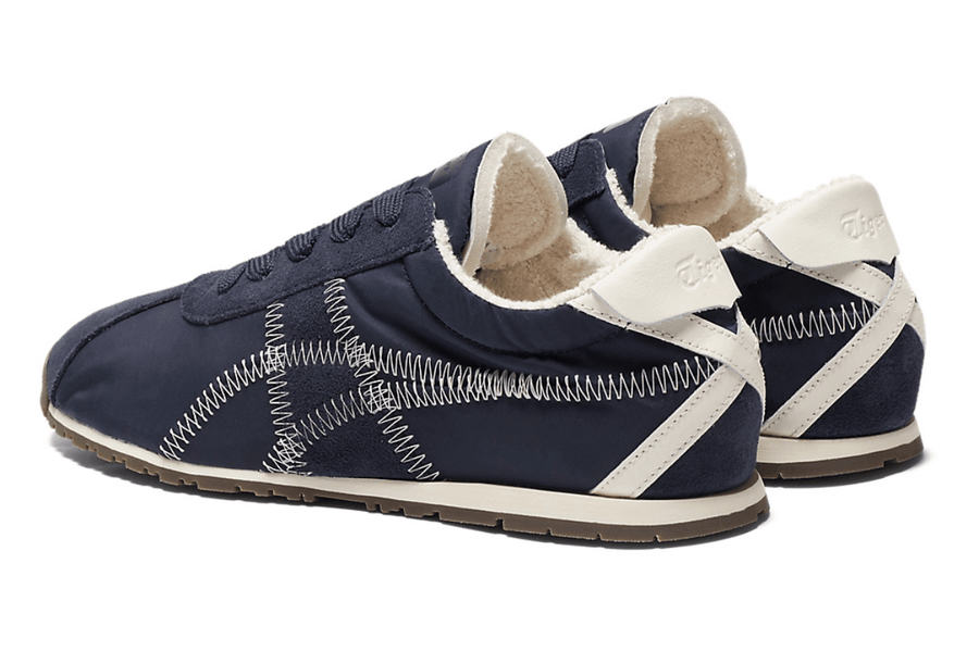Vista em detalhe do Onitsuka Tiger Onitsuka Tiger Tiger Corsair A55 Midnight Cream mostrando textura do material e acabamento