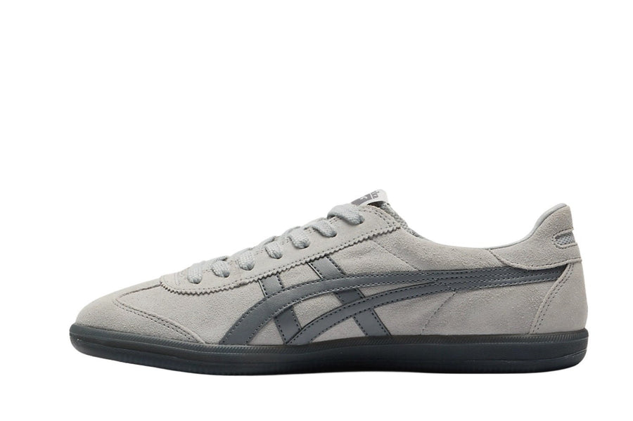 Vista lateral do Onitsuka Tiger Onitsuka Tiger Tokuten mostrando design do cabedal e logo da marca