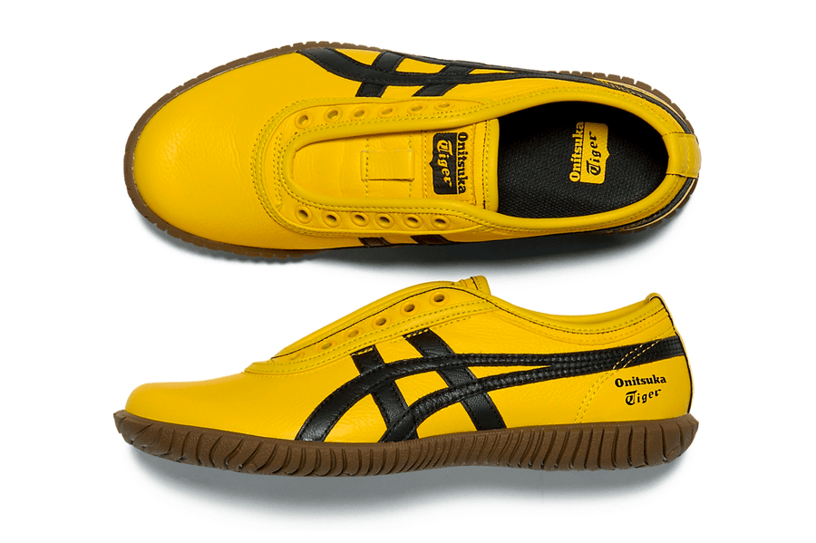 Vista na caixa do Onitsuka Tiger Onitsuka Tiger Tsunahiki Slip-On Sunflower Yellow/Black mostrando embalagem original da marca