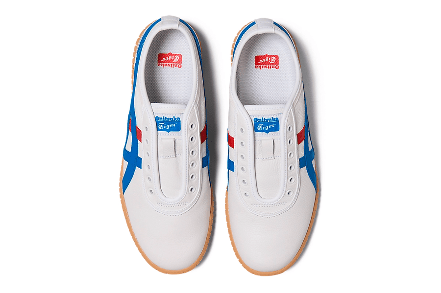 Vista do solado do Onitsuka Tiger Onitsuka Tiger Tsunahiki Slip-On White/Directoire Blue mostrando padrão de tração e tecnologia de amortecimento