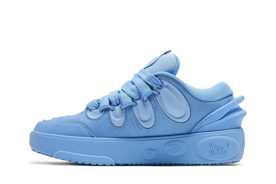 Vista lateral do Puma Puma LaFrancé Moment Team Light Blue x Lamelo Ball mostrando design do cabedal e logo da marca