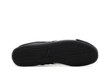 Vista traseira do Puma Puma Speedcat Og Black White mostrando calcanheira e detalhes do solado