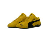 Vista traseira do Puma Puma Speedcat OG Pelé Yellow Black mostrando calcanheira e detalhes do solado