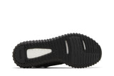 Vista traseira do Yeezy Adidas Yeezy Boost 350 Pirate Black 2023 mostrando calcanheira e detalhes do solado
