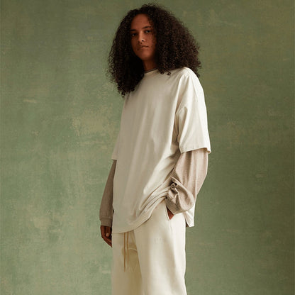 Camiseta Oversized Essentials Fear of God &quot;Cloud Dancer&quot; Branco - Camiseta - LK Sneakers - 