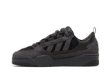 Vista lateral do Adidas ADI2000 Triple Black mostrando design do cabedal e logo da marca