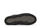 Vista traseira do Adidas ADI2000 Triple Black mostrando calcanheira e detalhes do solado