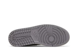 Vista traseira do Jordan Nike Air Jordan 1 Low Inside Out Black mostrando calcanheira e detalhes do solado