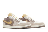 Vista frontal do Jordan Nike Air Jordan 1 Low SE Craft Inside Out Taupe Haze mostrando biqueira e costuras