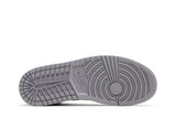 Vista traseira do Jordan Nike Air Jordan 1 Mid SE Craft Inside Out Black mostrando calcanheira e detalhes do solado