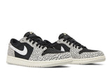 Vista frontal do Jordan Nike Air Jordan 1 Retro Low OG 'Black Cement' mostrando biqueira e costuras