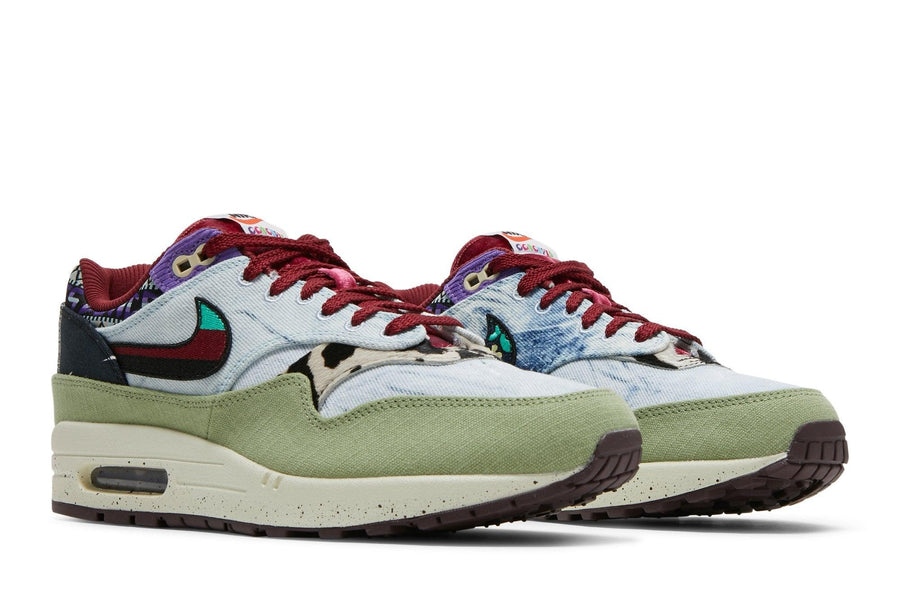 Vista frontal do Nike Concepts x Air Max 1 SP Mellow Colorido mostrando biqueira e costuras
