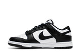 Vista lateral do Nike Nike Dunk Low Black OG Panda mostrando design do cabedal e logo da marca