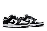 Vista frontal do Nike Nike Dunk Low Black OG Panda mostrando biqueira e costuras