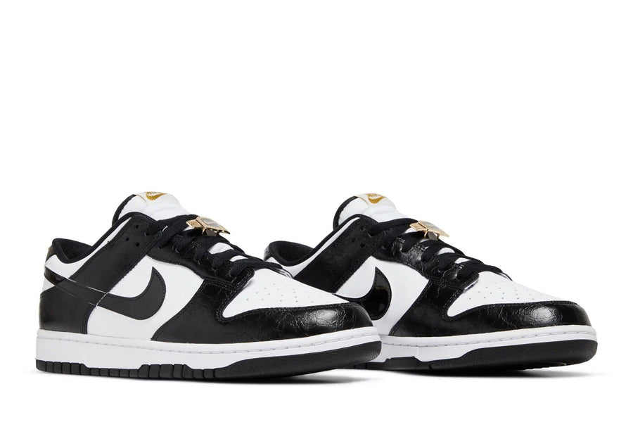 Vista frontal do Nike Nike Dunk Low Black World Champ mostrando biqueira e costuras