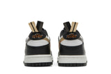 Vista superior do Nike Nike Dunk Low GS Black/White Metallic mostrando abertura, lingueta e cadarços