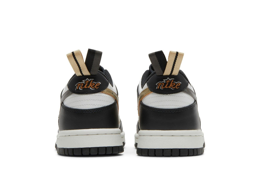 Vista superior do Nike Nike Dunk Low GS Black/White Metallic mostrando abertura, lingueta e cadarços