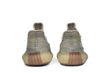 Vista superior do Yeezy Yeezy Boost 350 v2 Citrin mostrando abertura, lingueta e cadarços